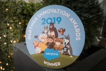 Circular Salesforce Partner Innovation Awards 2019 plaque with mascots.