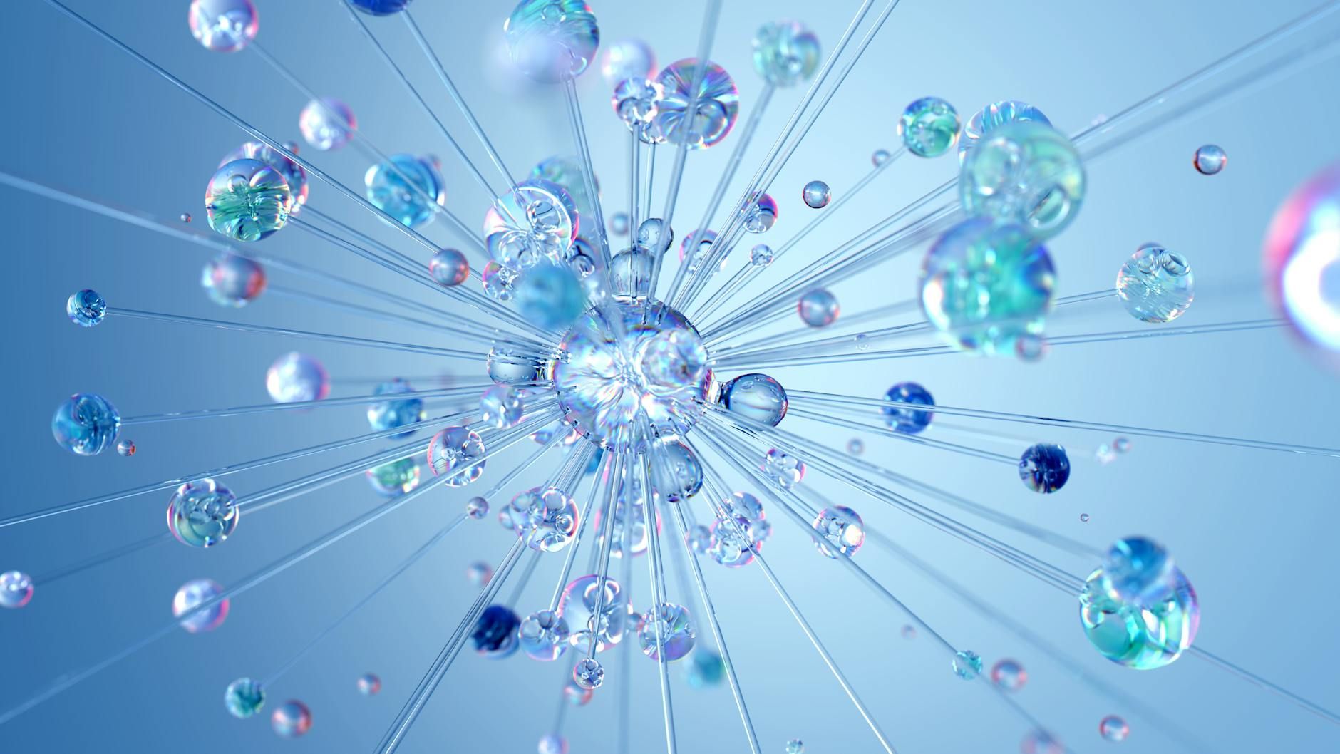 Abstract cluster of clear, blue, and green spheres connected by radiating lines on a light blue background.