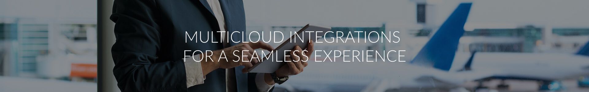 Professional in suit with 'MULTICLOUD OPERATIONS EXPERIENCE' text, blurred airport setting.