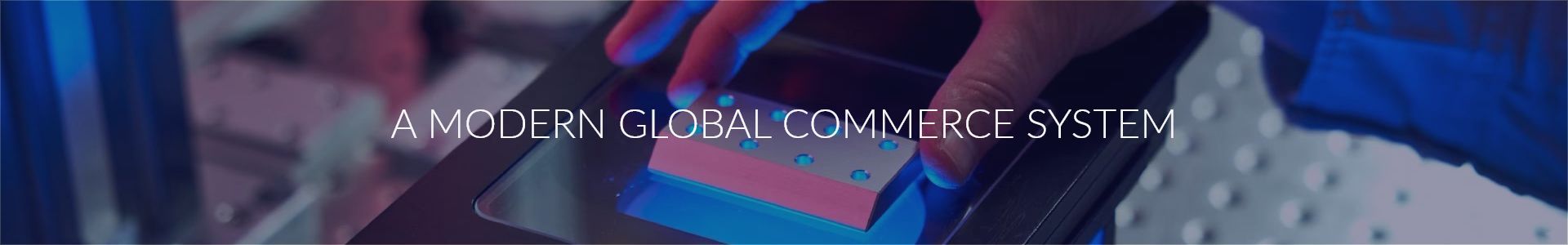 Text AMDOO GLOBAL COMMERCE SYSTEM displayed against a blurred colorful background.